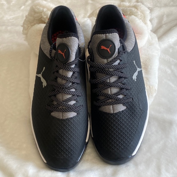 PUMA Black and Gray Athletic Shoes with Red Logo